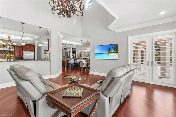 Family Room, Wall mounted, TV access to pass through kitchen.