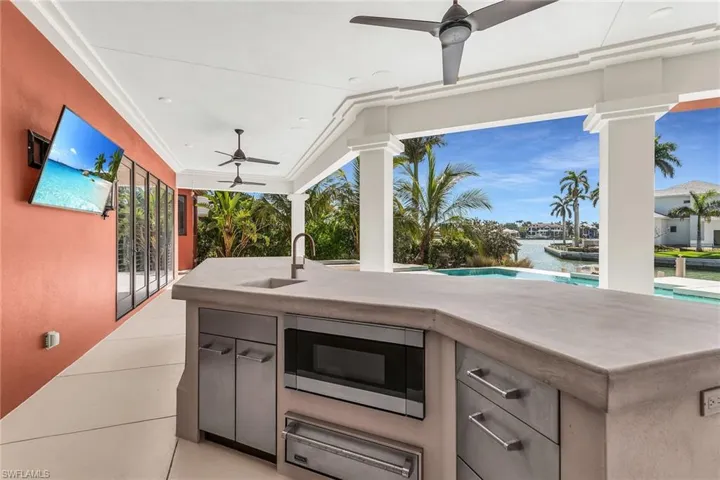 Outdoor Kitchen Viking Appliances, wall mounted TV.