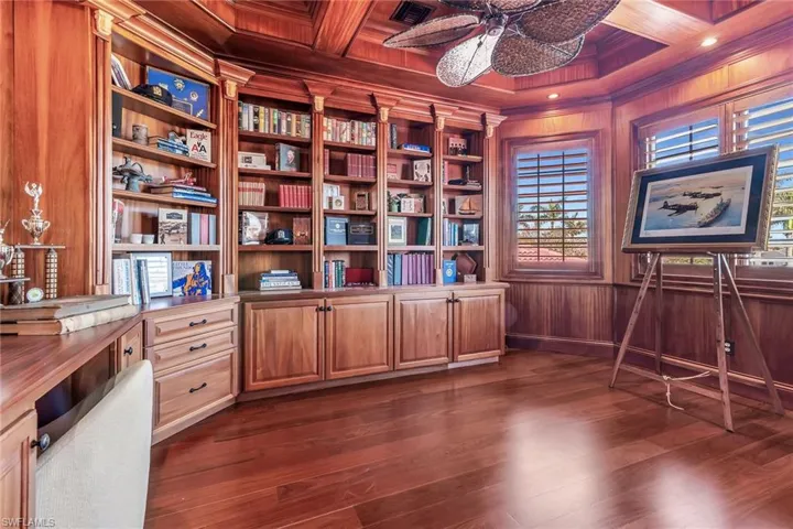 Library with custom wood cabinetry.