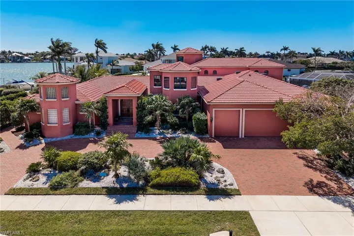 1411 Quintara Court, circular drive,3 car garage, native landscaping