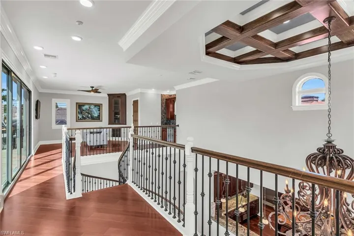 Upper level Sonos stereo system, TV, wet bar and half bath.