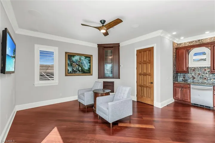 Upper level Sonos stereo system , TV, wet bar and half bath.