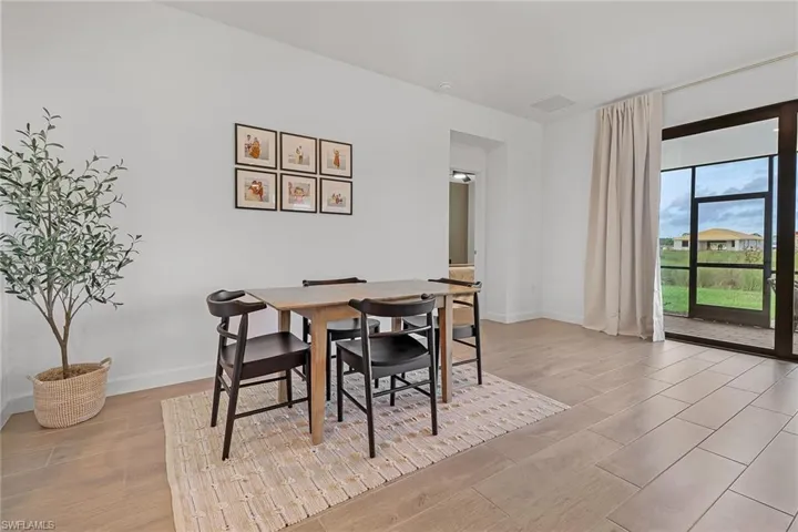 Dining area featuring light hardwood / wood-style floors