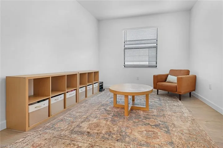 Living area featuring light hardwood / wood-style flooring