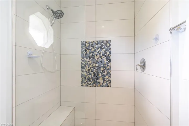 Bathroom with tiled shower