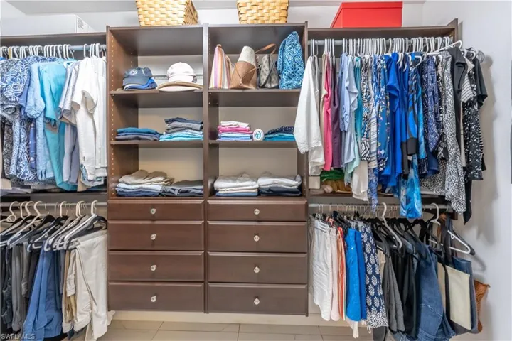 Spacious closet with tile patterned floors