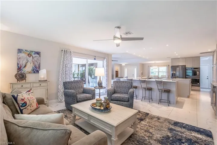 Living room featuring ceiling fan