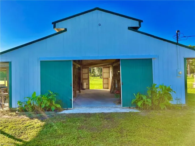 A large metal pole barn garage gives you lots of storage space. Do you have any big boy toys or boats?