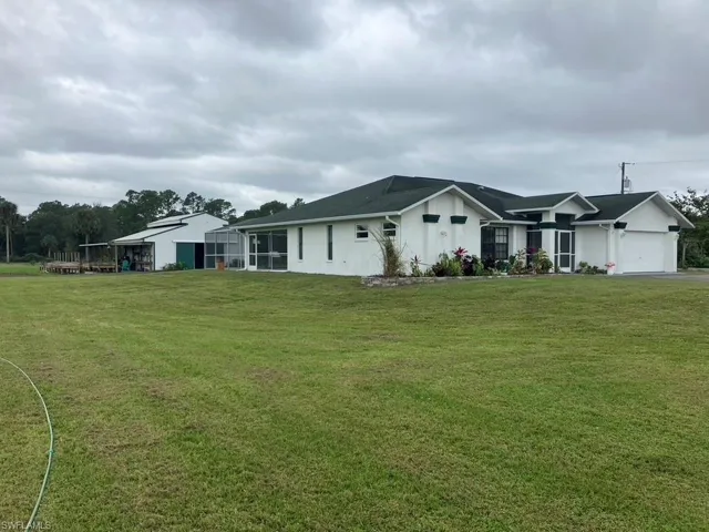 An amazing property on just under 5 Acres, with a 2 car garage