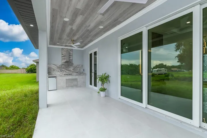 View of patio with ceiling fan