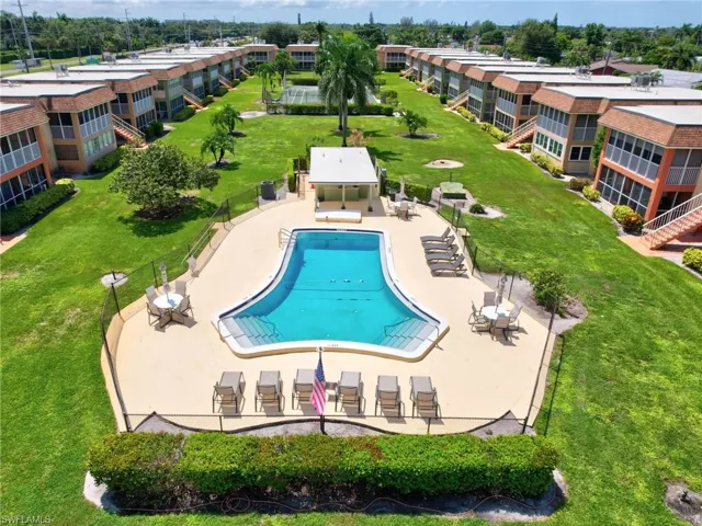 Community pool with a patio area