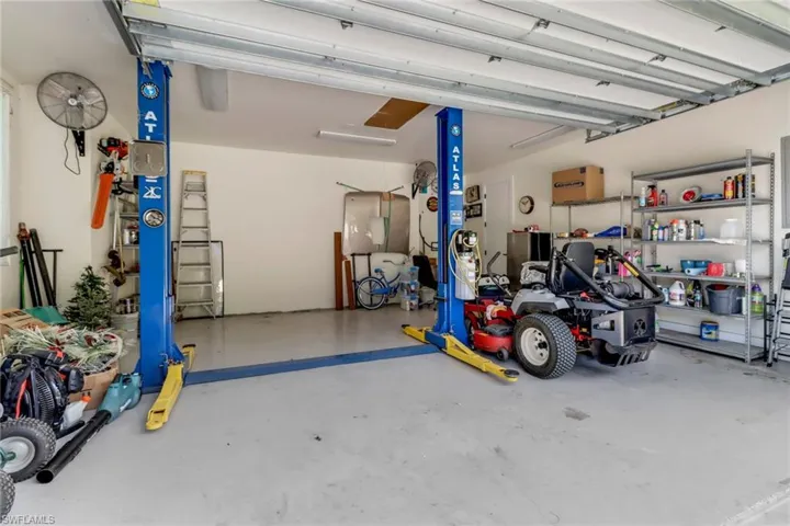 View of garage, lift does not convey