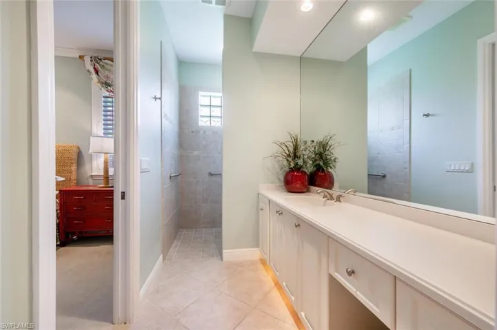 Guest bedroom 1 ensuite with walking in tile shower