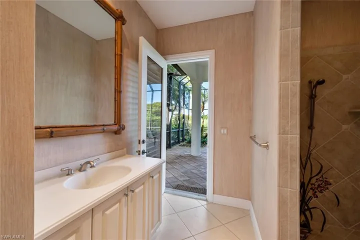Guest bathroom close to the 2nd guest bedroom and also has access from the pool/lanai area