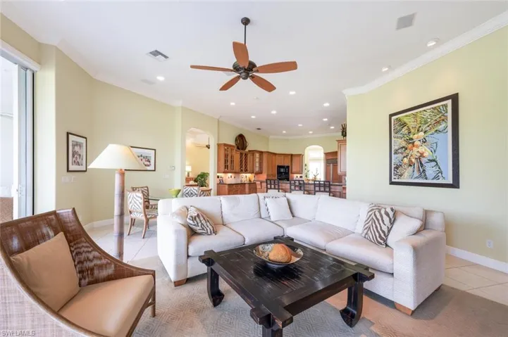Crown Molding and tile floor that runs throughout the mail living areas