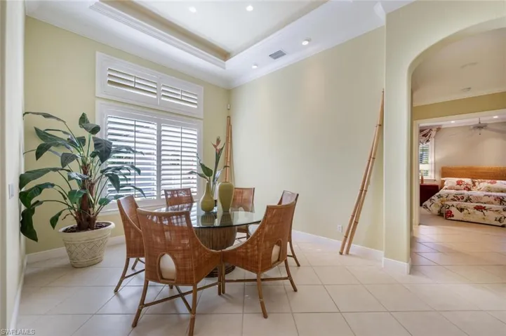 Formal Dining Area with Trey Ceilings and Plantation Shutters