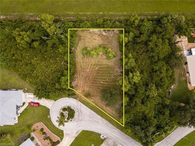 Aerial overview of property's location featuring property parcel outlined