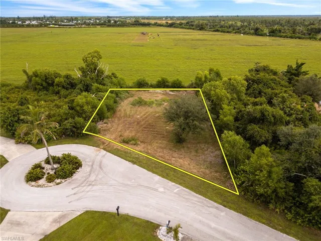 Aerial view of property's location featuring property parcel outlined