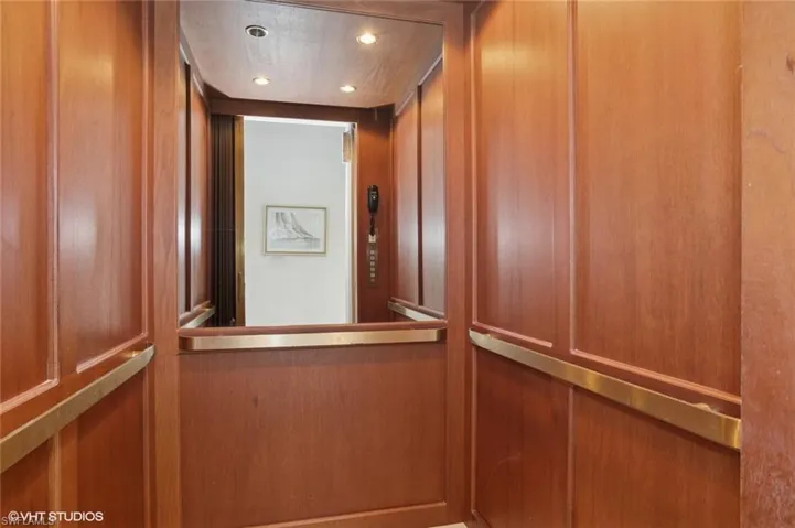 Details with recessed lighting and elevator