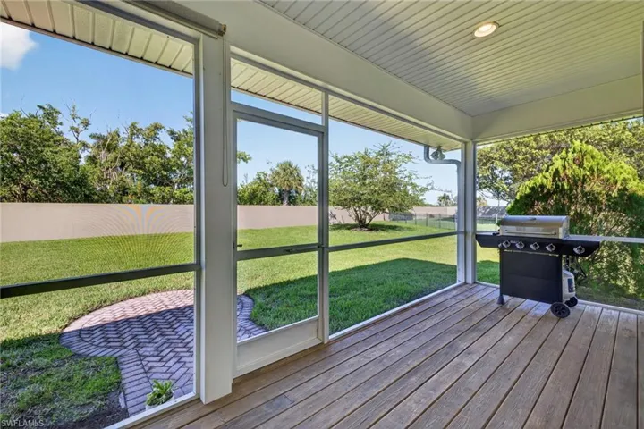 Unfurnished sunroom featuring healthy amount of natural light