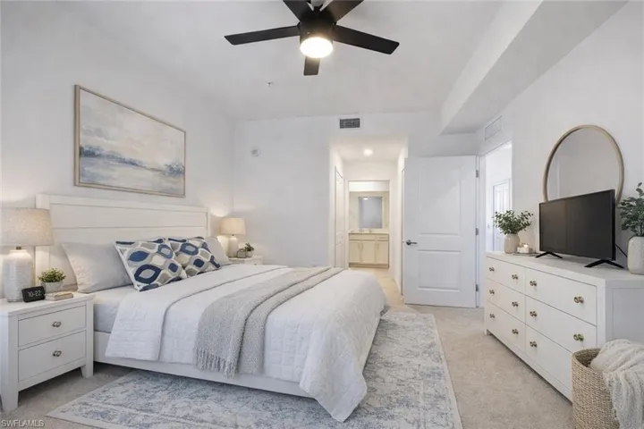 Spacious Main Bedroom - Staged with wall art