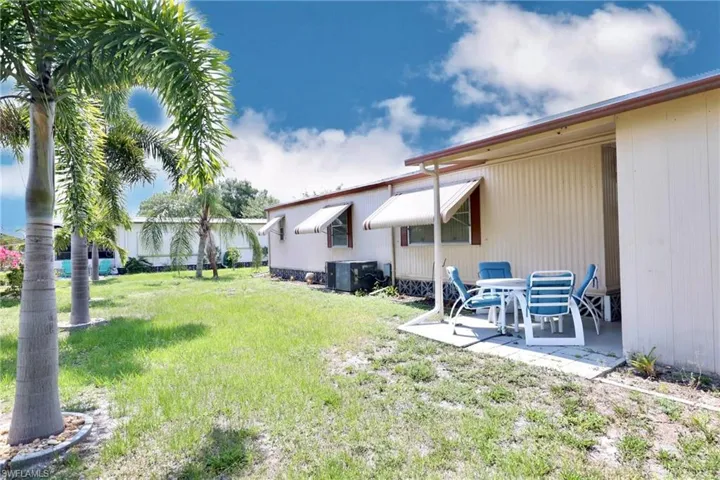 View of yard featuring a patio area and central AC