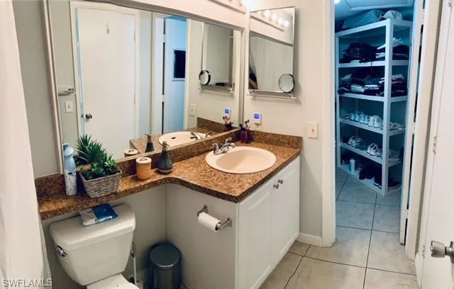 Bathroom featuring vanity and light tile patterned flooring