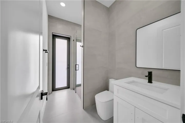 Bathroom with toilet and vanity