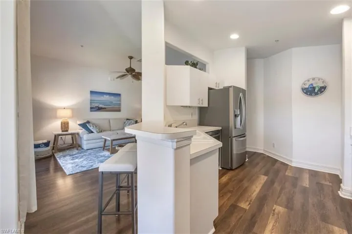 Kitchen leads to dining room, attached to lanai and opens into the living room.