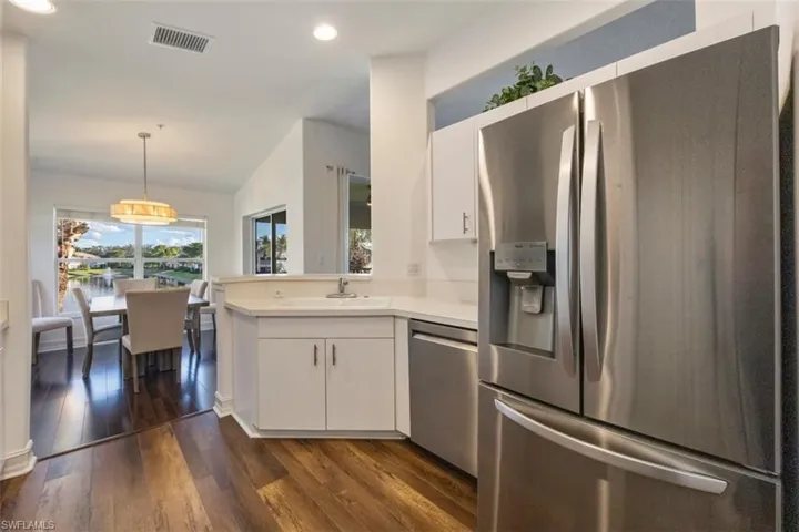 Open views through kitchen to take in the beautiful fountains with plenty of room for more than one cook in the kitchen!