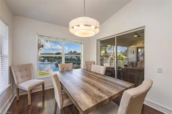Tastefully designed dining space to reflect the natural color palette reflecting Naples coastal chic beach life.