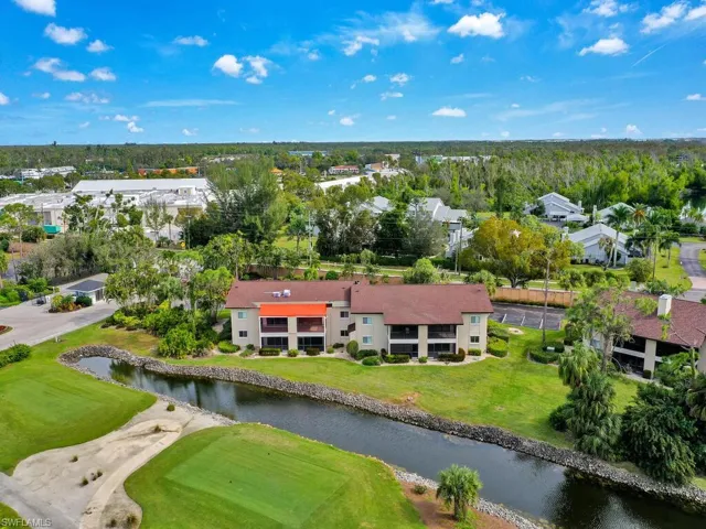 Bird's eye view with a residential view and a water view