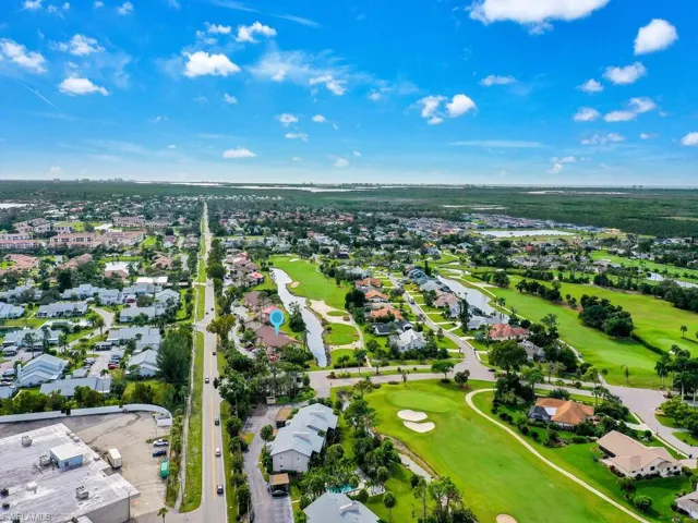 Drone / aerial view featuring a residential view and view of golf course