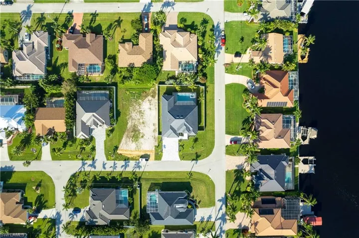 Nestled on an oversized, fully fenced lot, this outdoor space offers both privacy and security, making it an ideal sanctuary for family fun or serene relaxation!
