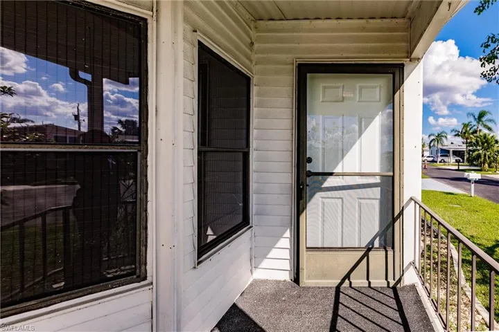 Entrance to property featuring a balcony