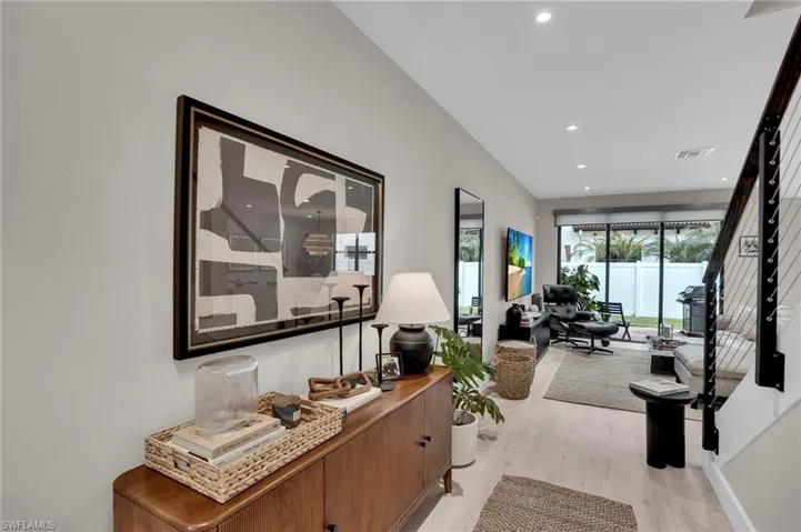 Hall featuring recessed lighting and light wood-style flooring
