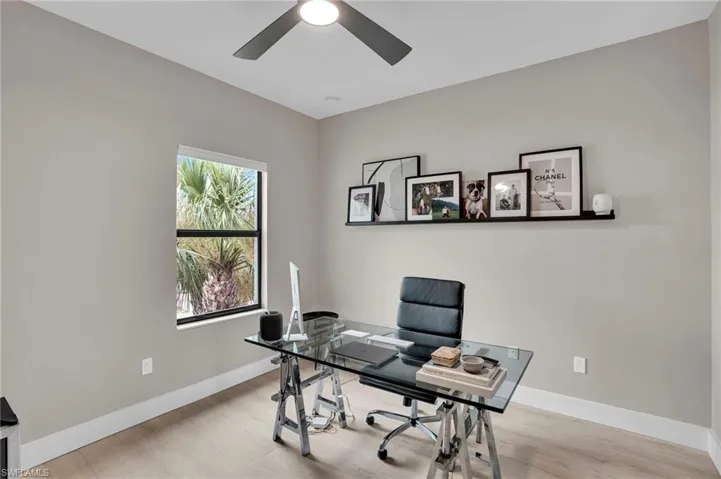 Office space featuring wood finished floors