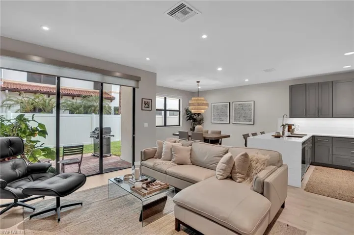 Living room featuring recessed lighting and light wood-style flooring