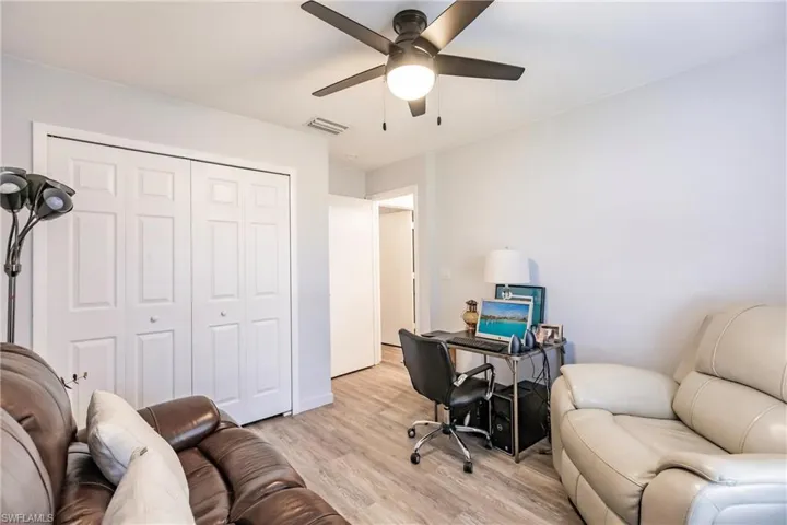 Office featuring light hardwood / wood-style floors and ceiling fan