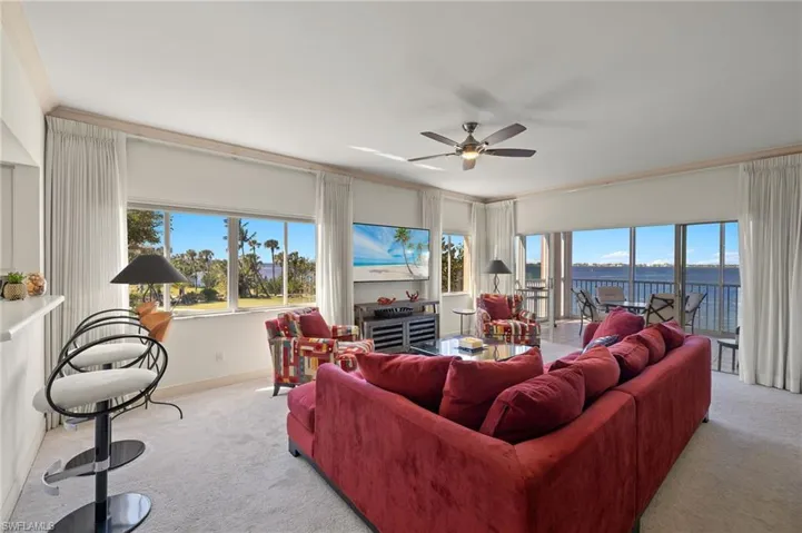 Living room featuring Marina, Beach and wide River views from everywhere