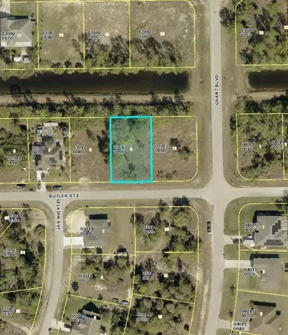Aerial overview of property's location featuring property parcel outlined