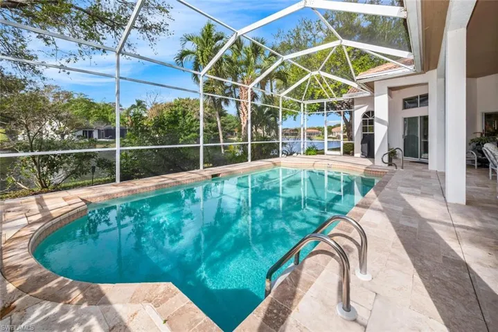 Beautiful pool and travertine lanai