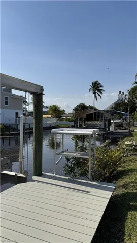 Dock featuring a water view
