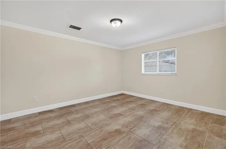 Guest Bedroom with walk in closet.