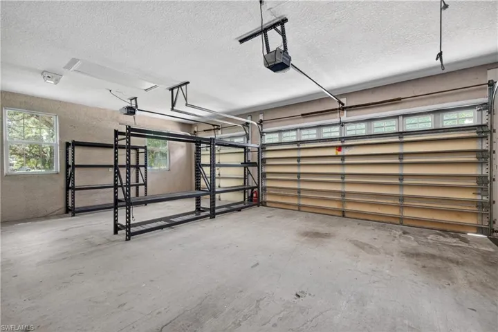 Large three car garage with 10' ceilings.