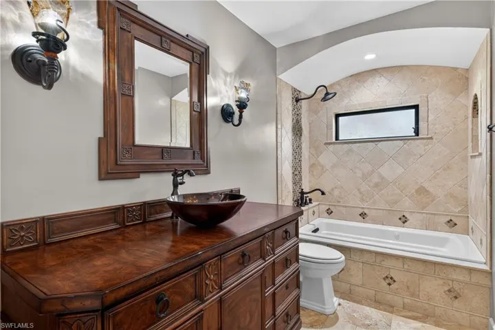 Guest bathroom with jetted tub.