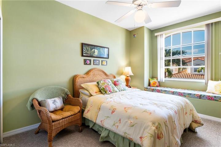 2nd bedroom has a lovely seating area to curl up and read a good book!!