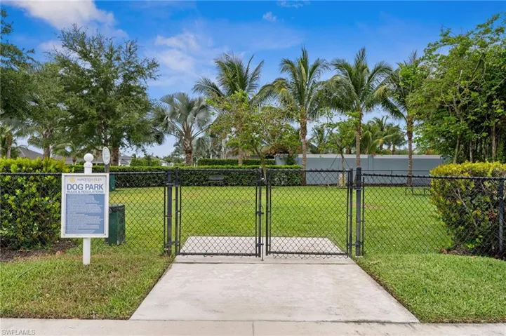 View of gate with a yard