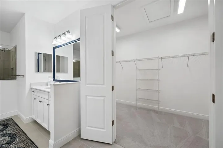 Bathroom with tile flooring and oversized vanity