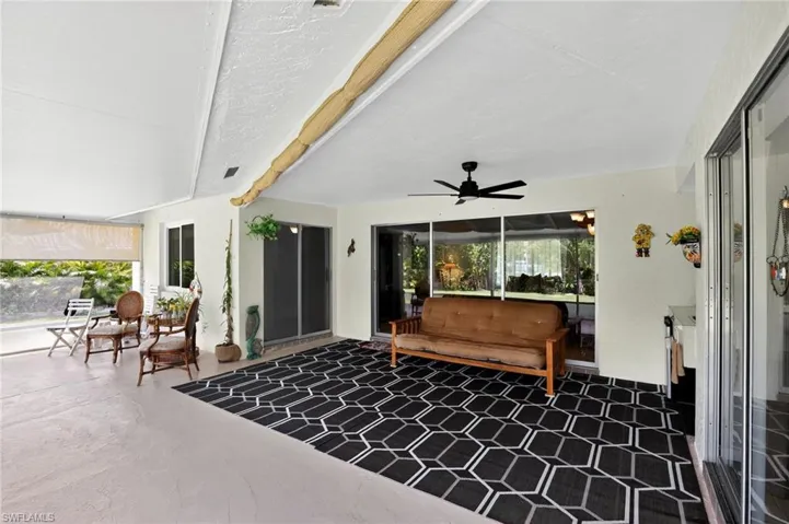 View of patio featuring a ceiling fan